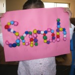 Name collage using pom poms Name collage using pom poms