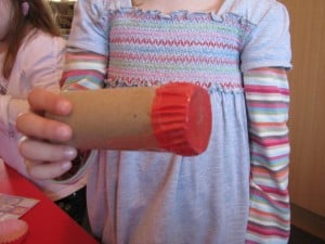 Use sticky tape to attach the patty pan