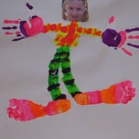 Kids painting a picture of themselves