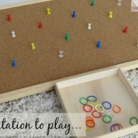 Invitation to play with push pins and elastics bands for fine motor