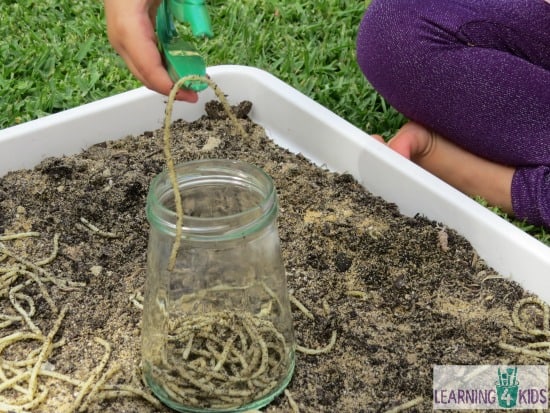 Digging for spaghetti worms - sensory fun for kids