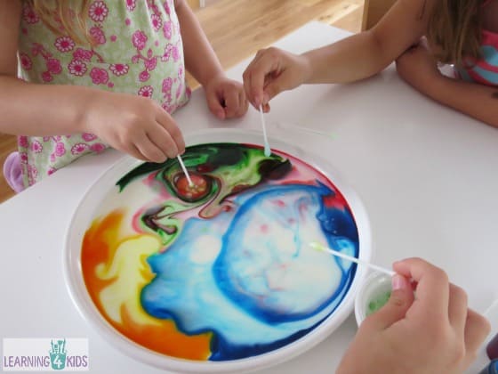 milk and colours science experiment for kids using dish soap