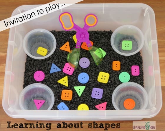 Learning about shapes in a sensory bin activity