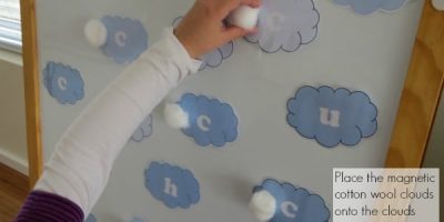 Place the magnetic cotton clouds onto the letter c