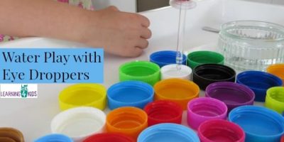 Water play with eye droppers encourages pincer grasp by learning 4 kids