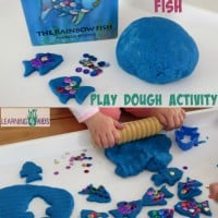 The Rainbow Fish by Marcus Pfister inspired activity - using play dough and sequins to re-create the story