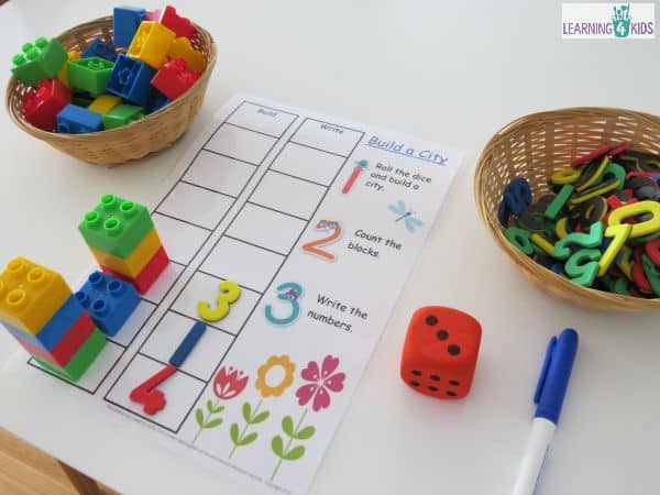 Build a city counting and subitising game using dice and blocks