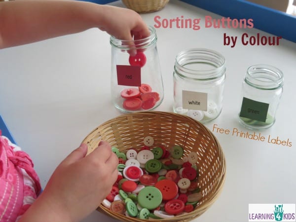 Sorting buttons by colour - colour recognition activity for kids.  Free printable labels