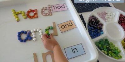 Build a sight word using wooden alphabet letters and glass gems. Free printable sight word cards.