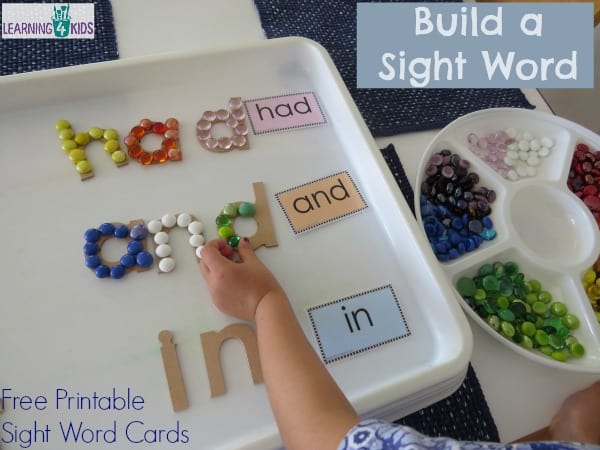 Build a sight word using wooden alphabet letters and glass gems.  Free printable sight word cards.
