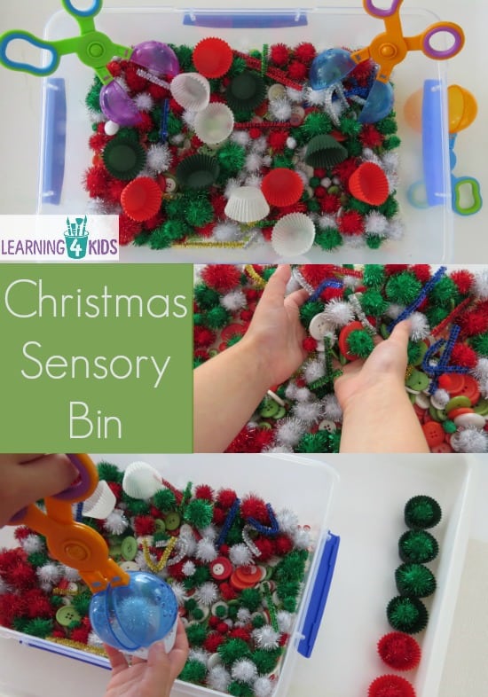 Christmas sensory bin filled with pompoms, pipe cleaners, buttons and cupcake cases.