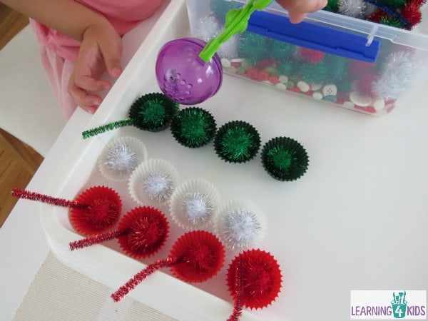 Christmas sensory tub and fine motor fun activity.