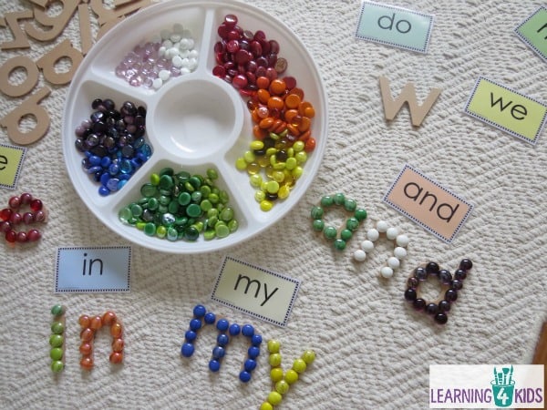 Create sight words with wooden letters and glass gems.  Free printable sight word cards at Learning 4 Kids