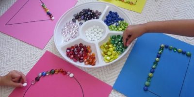 Simple small group activity learning about shapes- great for maths centres or work stations.