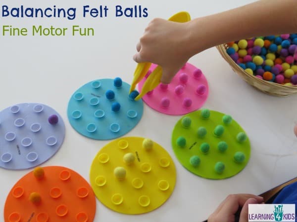 Balancing Felt Balls Challenge for fine motor fun and coordination.