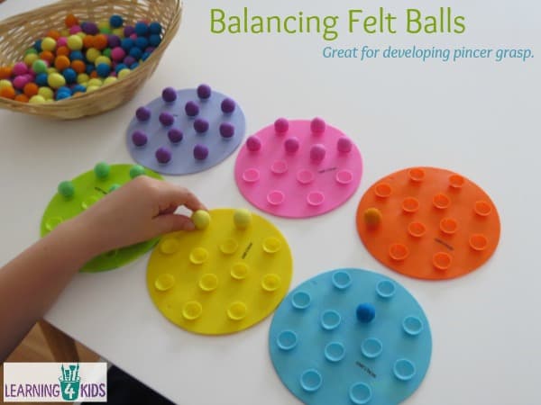 Balancing felt balls - great for developing pincer grasp