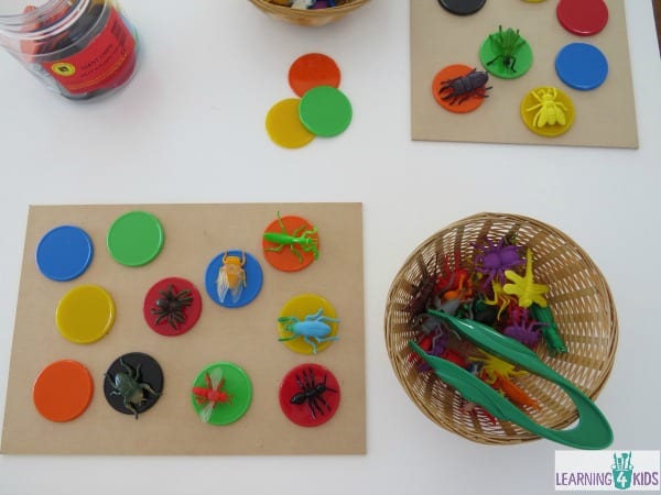 Fine motor activity moving bugs with tweezers onto a token or counter