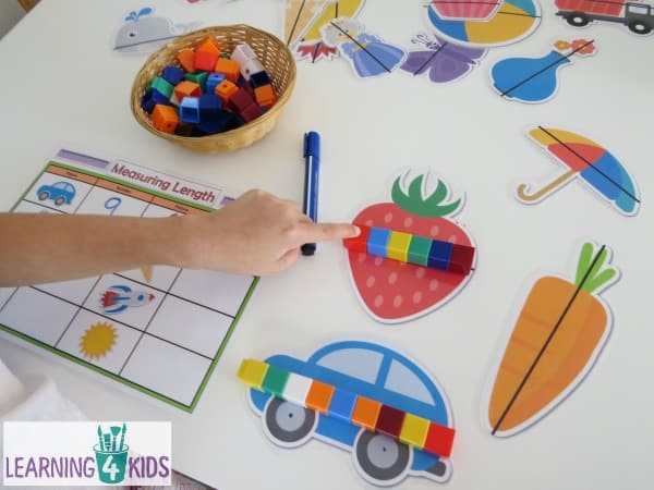 Printable Measuring Length Activity Mats - measure along the line on each picture and record the answer on the mat